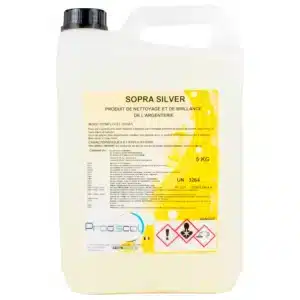 Un conteneur en plastique de 5 kg étiqueté "SOPRA SILVER : Liquide pour la rénovation de l'argenterie et des métaux légers à usage professionnel", avec des instructions d'utilisation et des symboles de danger sur le devant.
