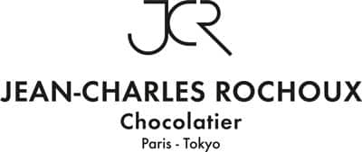 Logo pour Jean-Charles Rochoux Chocolatier reprenant les initiales "JCR" au-dessus du nom de la société et des villes de Paris et Tokyo.